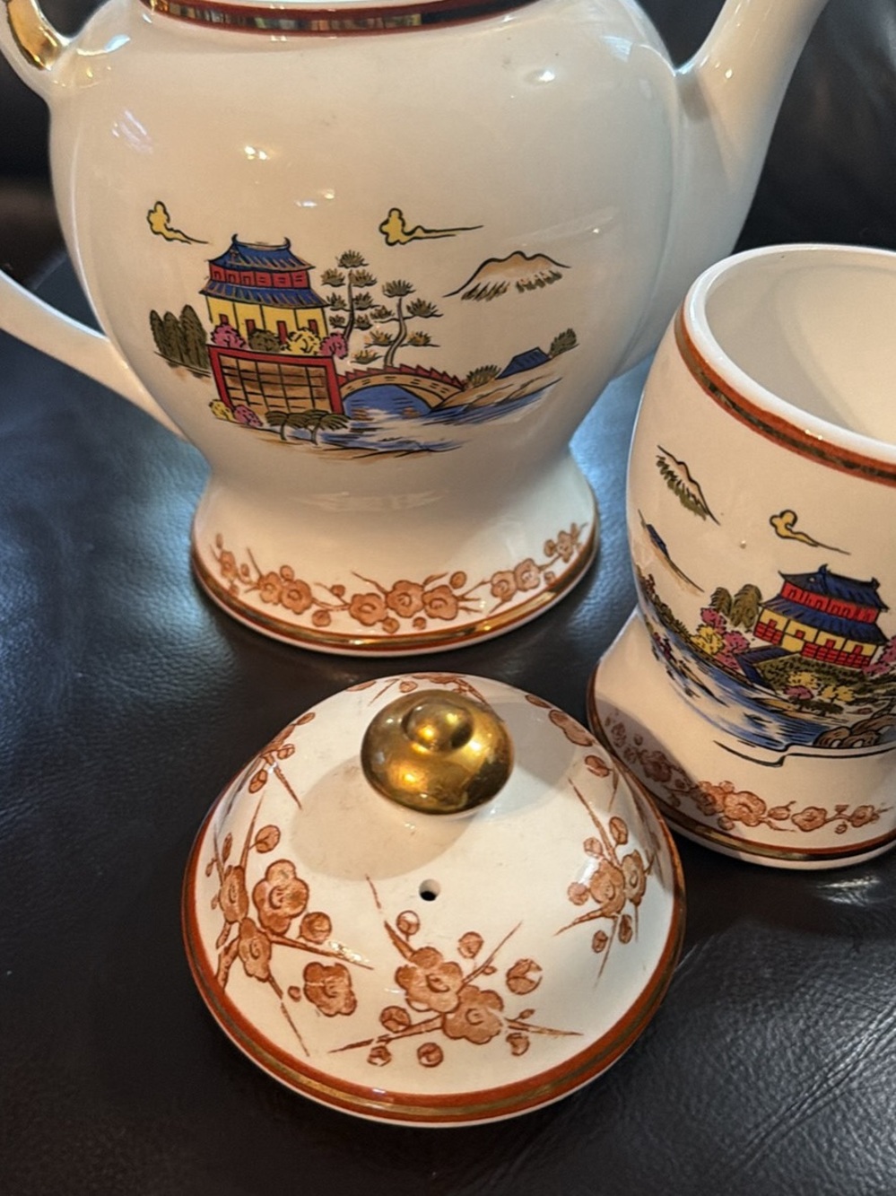 White Ceramic Tea Set with Gold Trim and Oriental Scenic Design
